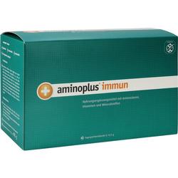 Grüne Packung von Aminoplus Immun, ein Nahrungsergänzungsmittel.
