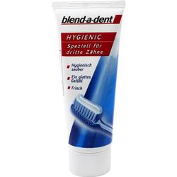 Weiße Zahnpastatube mit blauem und rotem Design für künstliche Zähne.
